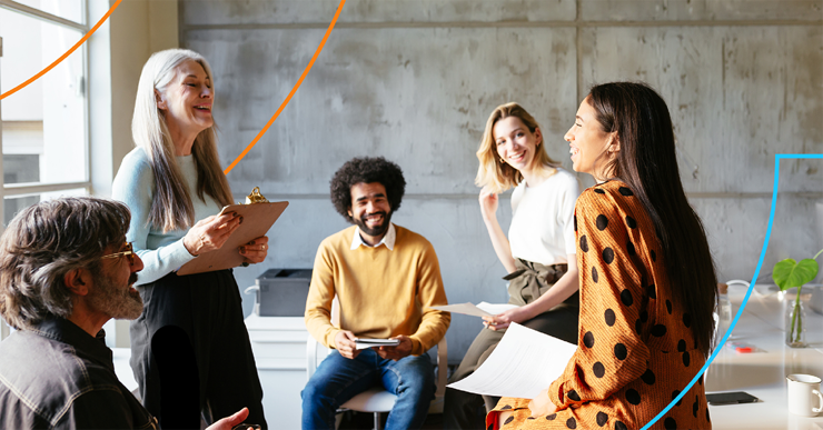 a group of people sitting and standing